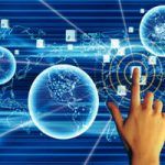 Man’s hand touching computer key, globes, world map(digital composite)
